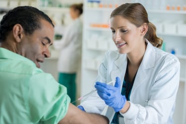 Pharmacist giving vaccination